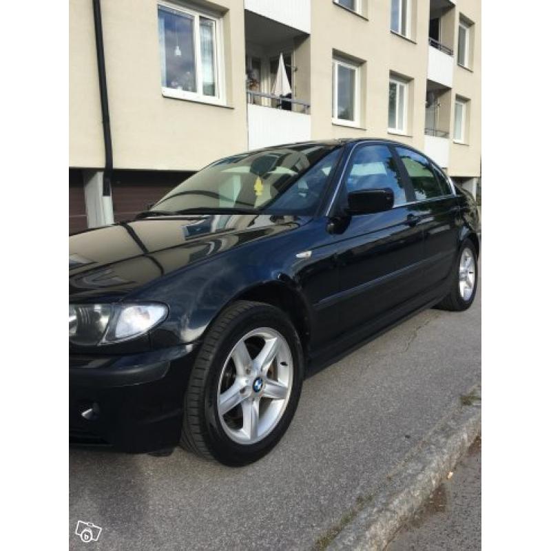 BMW 320i -03