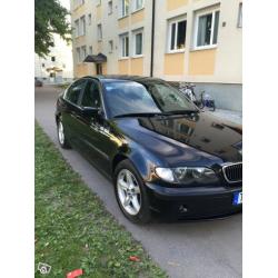 BMW 320i -03