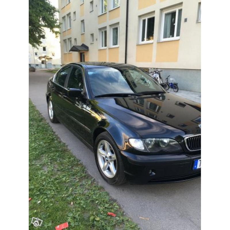 BMW 320i -03